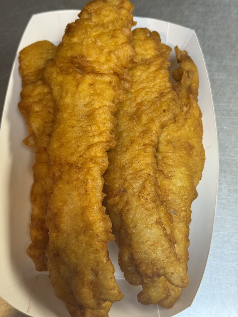 Golden-brown battered fish fillets from London's Best Fish & Chips, served in a white paper tray.